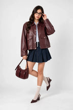 24 CHAQUETA CORTA EFECTO PIEL IRIEL ONE.