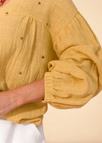 Mustard linen-effect cotton shirt with V-neck, puff sleeves, and star appliqués, view 3