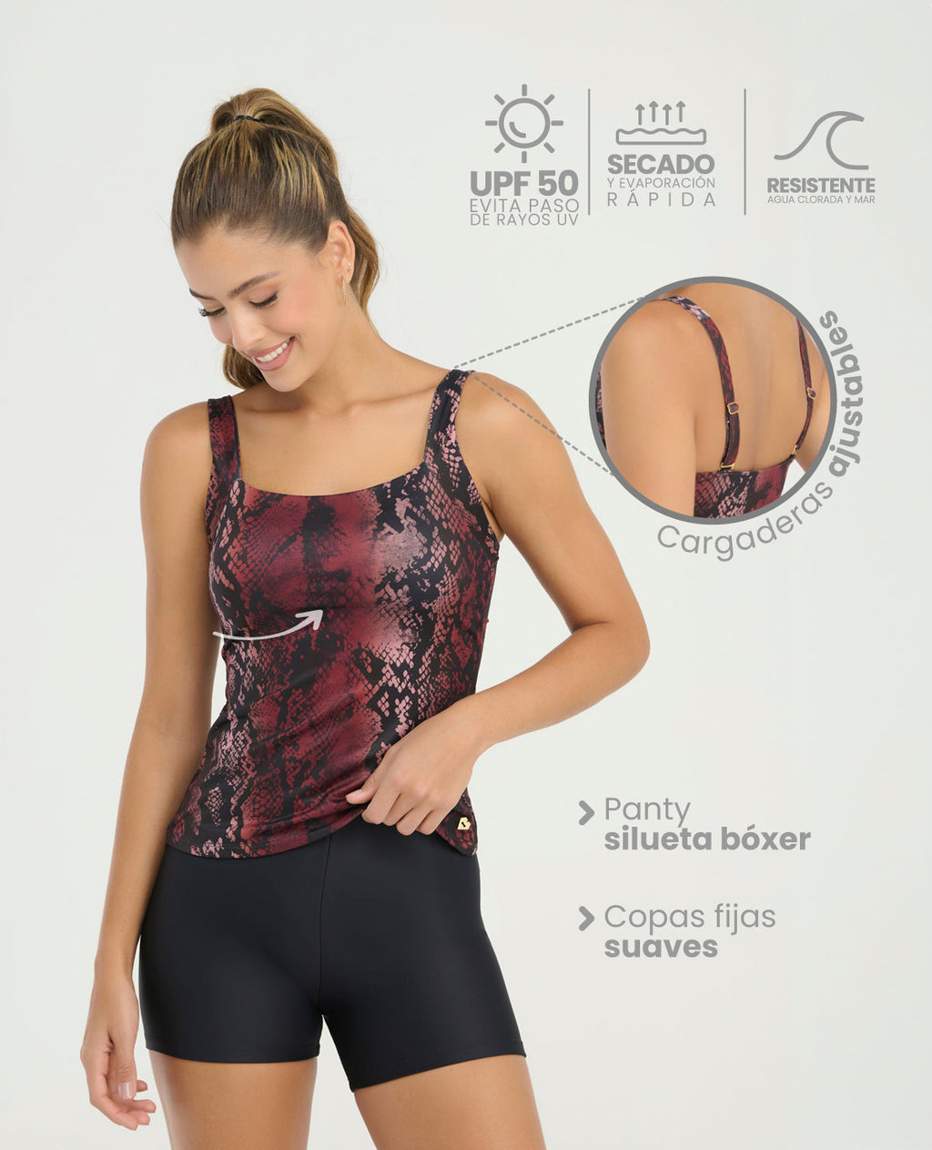Vestido de baño tankini animal print vinotinto con panty bóxer negro, copas fijas y cargaderas ajustables.