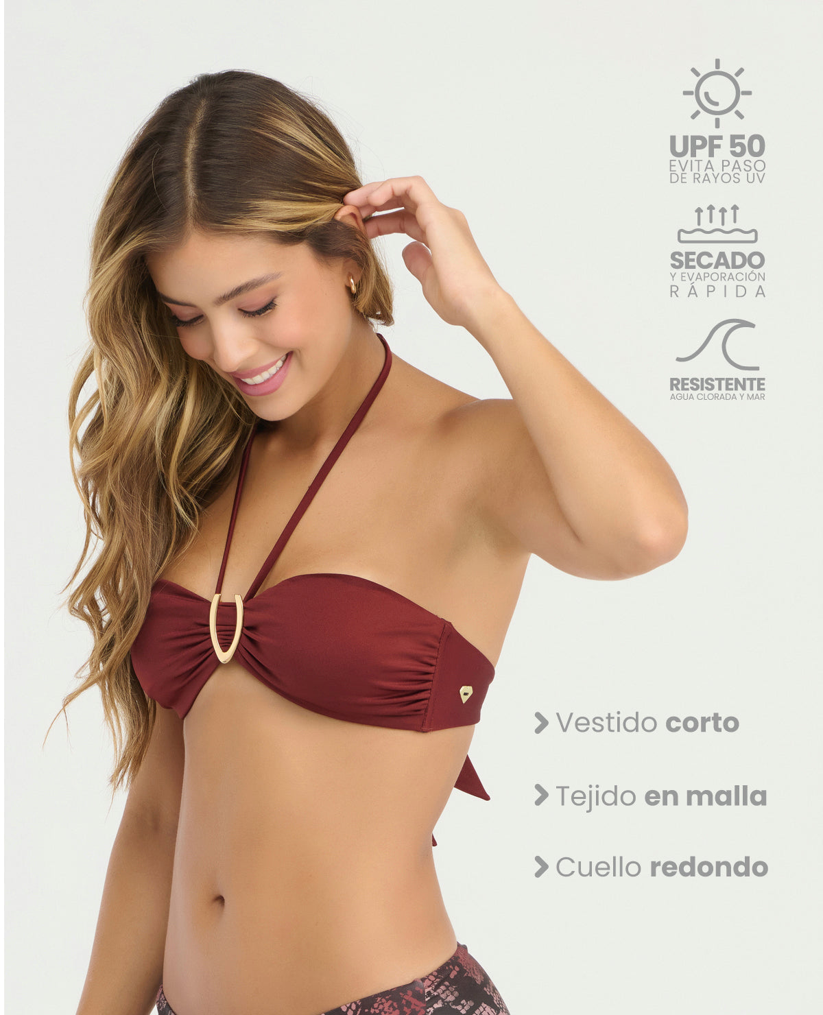 Top de baño strapless granate con detalle dorado, tiras ajustables al cuello y protección UV para mujer.
