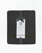 Elegant gray Bruna duvet cover set, featuring soft fabric and a sophisticated design for full, queen, or king beds.