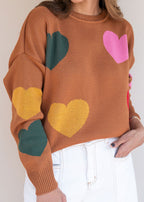 Brown acrylic knit sweater with multicolor heart pattern, round neck, and drop shoulders, view 2