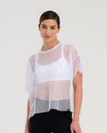 Camiseta cropped blanca St Even en malla transpirable, cuello redondo y silueta holgada para mujer.