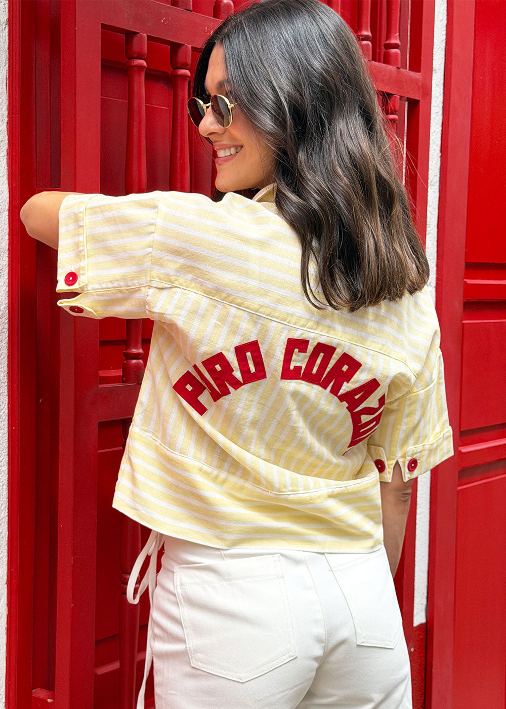short-sleeve yellow and white striped linen shirt front view