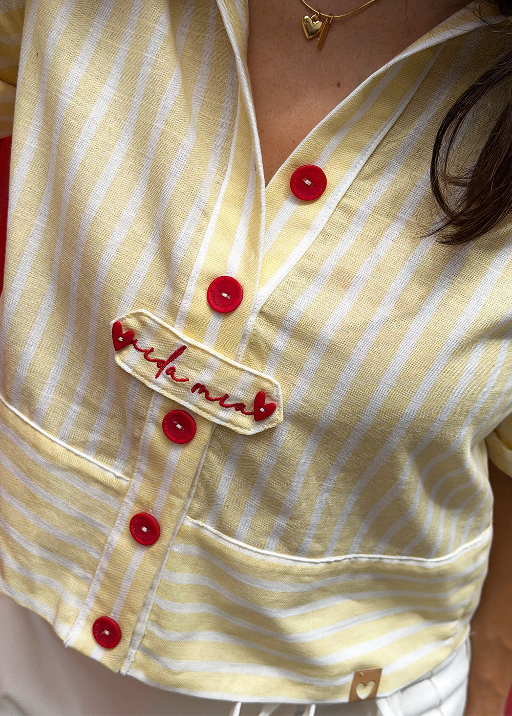 yellow striped cotton shirt cropped hem detail