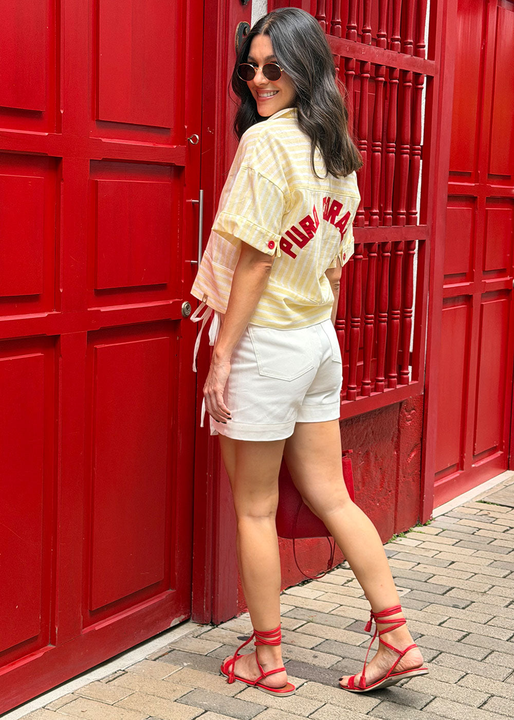 embroidered linen shirt band collar button placket close-up