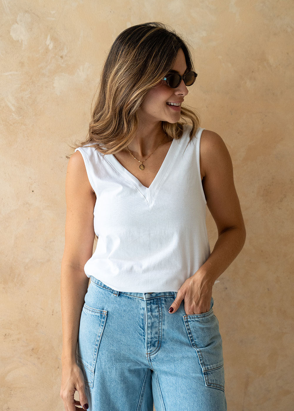 white knit top crossed open back detail