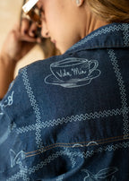 blue printed shirt fabric pattern close-up