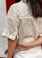 embroidered beige shirt cropped hem side view