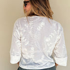 ivory three-quarter sleeve shirt knotted placket detail