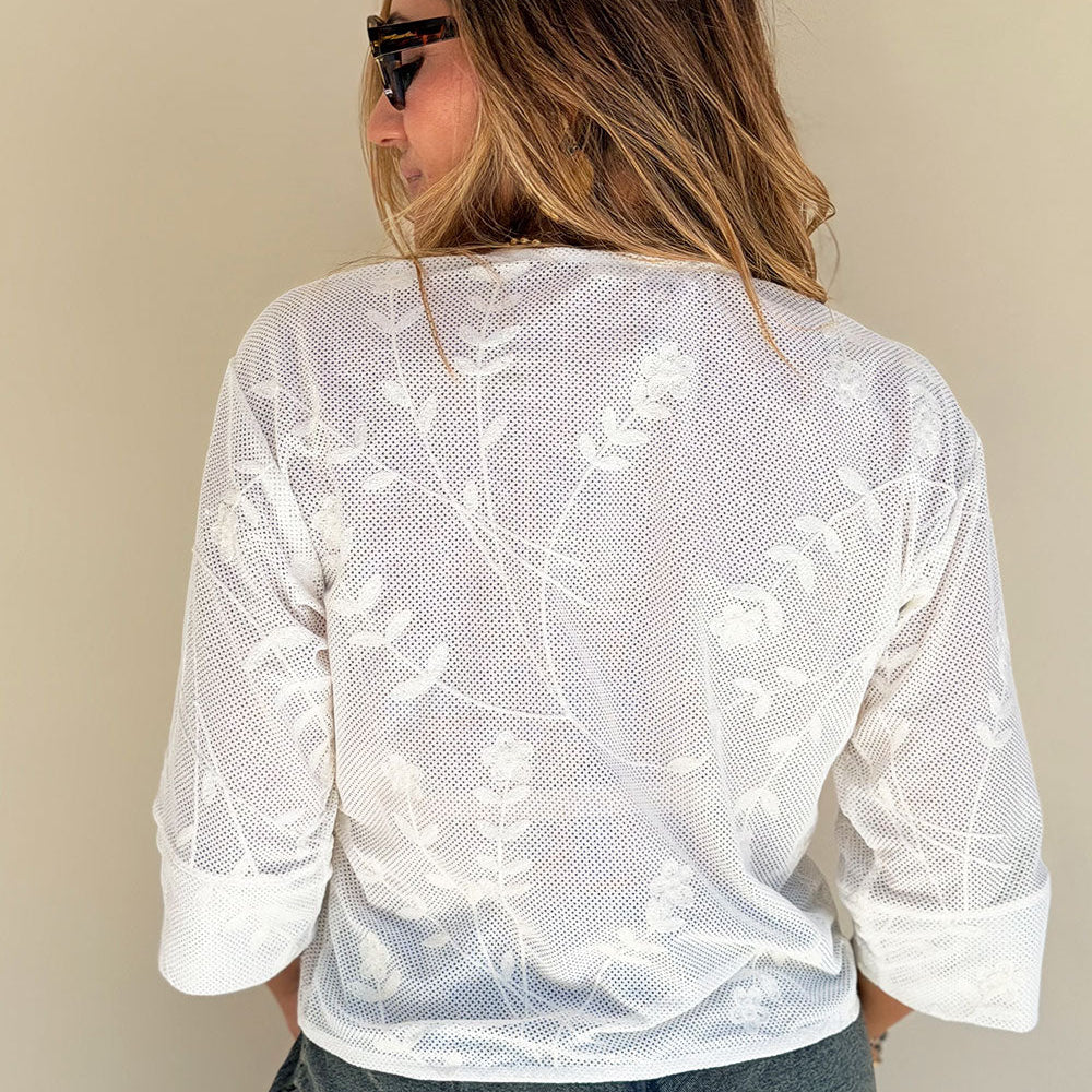 ivory three-quarter sleeve shirt knotted placket detail