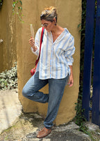 blue striped poplin long-sleeve shirt, styling detail close-up