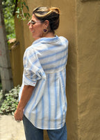 blue striped poplin long-sleeve shirt, full-length styled look