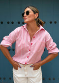Pink striped cotton shirt with sport collar, front pocket, and red heart-shaped buttons