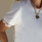 ivory lace-trim t-shirt round neckline semi-fitted silhouette