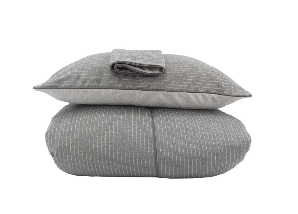Elegant Merida duvet cover set in a soft polyester-cotton blend, adding sophistication with crisp, neutral tones to your bedroom.
