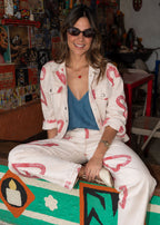 Ivory cotton drill denim jacket with all-over red heart print, front pockets, and barrel sleeves, view 3