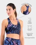 Top deportivo para mujer St. Even de soporte ligero con estampado dinámico azul y espalda cruzada.