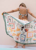 Green printed sarong styled as a body wrap on model
