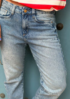 Washed indigo denim jean with belt loops, functional pockets, side cuts, and knee darts, view 3