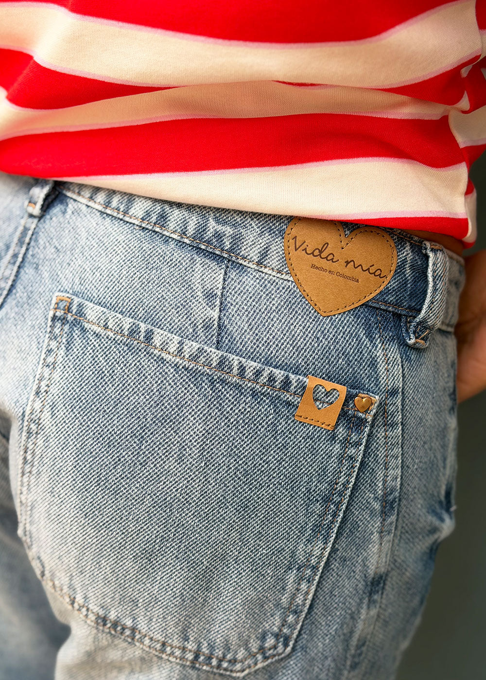 Washed indigo denim jean with belt loops, functional pockets, side cuts, and knee darts, view 6