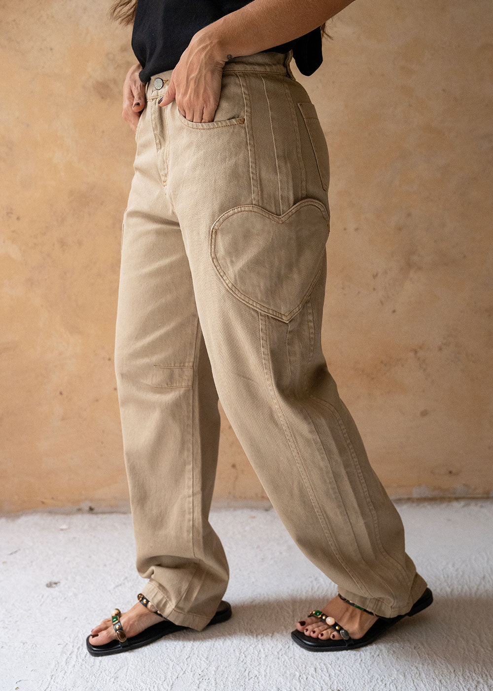 khaki denim jeans with heart patch pockets front view