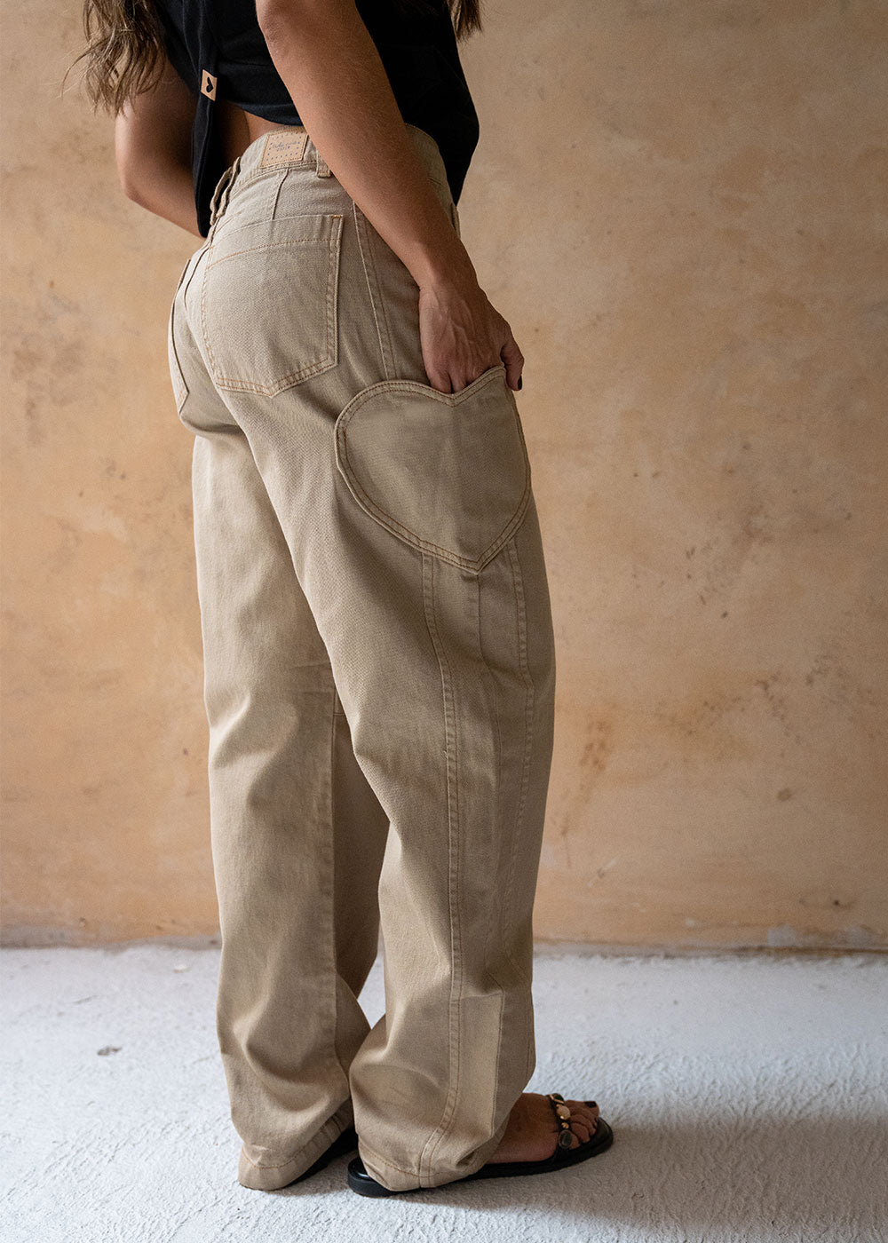 khaki cotton jeans full-length side profile
