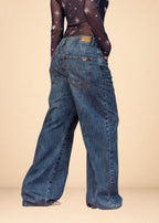 Rigid indigo denim jean with belted waistband, straight leg, and functional pockets, view 6