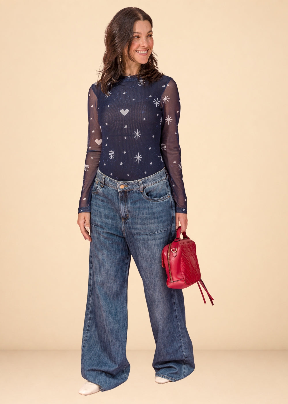 Rigid indigo denim jean with belted waistband, straight leg, and functional pockets, view 5