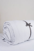 Cozy Montecarlo duvet insert with a lightweight, warm design and grid stitching to keep the eco-feather filling in place.