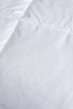 Cozy Montecarlo duvet insert with a soft, lightweight design and quilted vertical and horizontal stitching for even warmth.