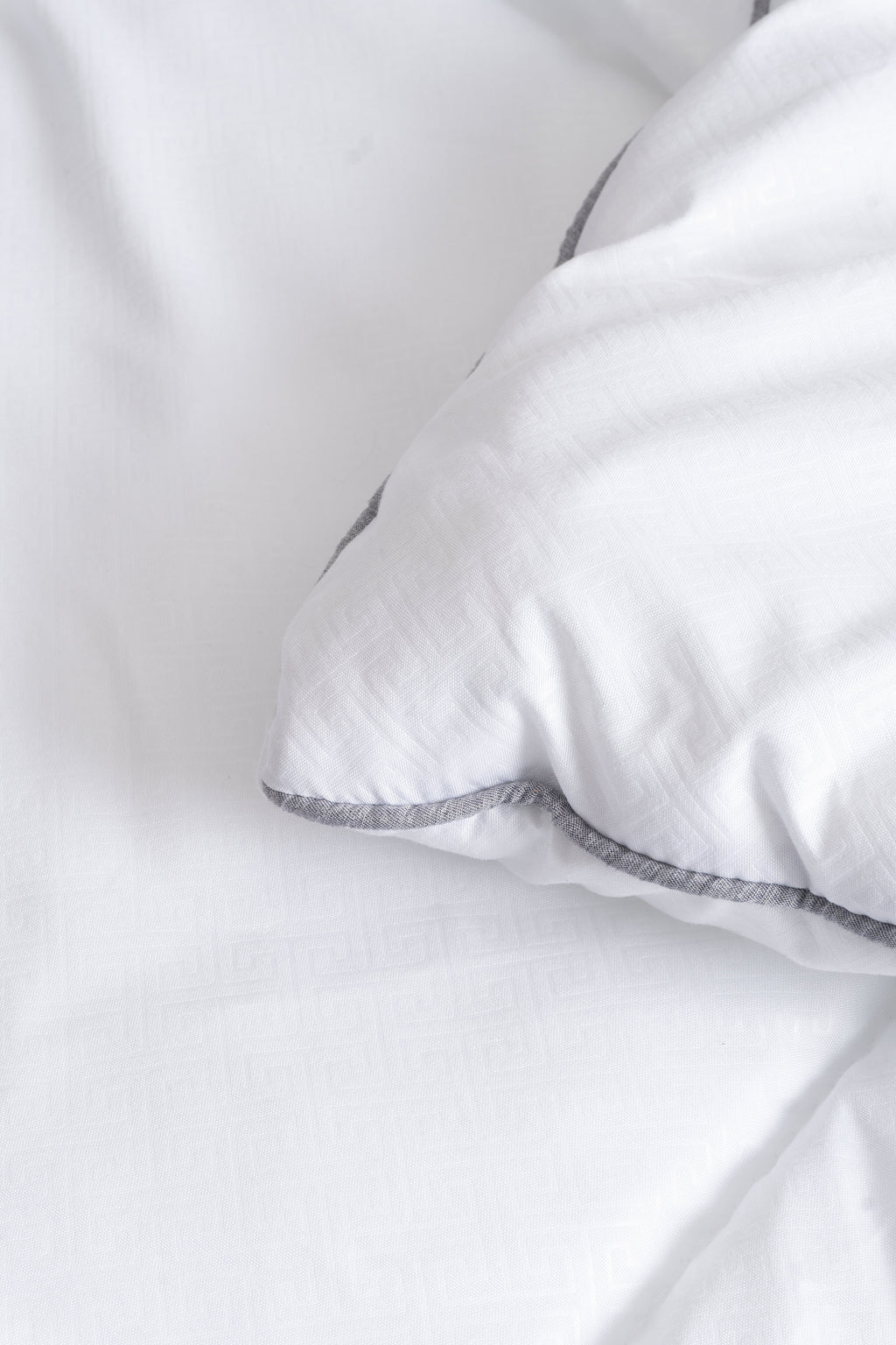 Cozy Montecarlo duvet insert with a soft, lightweight design and grid stitching to keep the eco-plum filling in place.