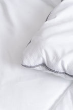 Cozy Montecarlo duvet insert with a soft, lightweight design and grid stitching to keep the eco-plum filling in place.