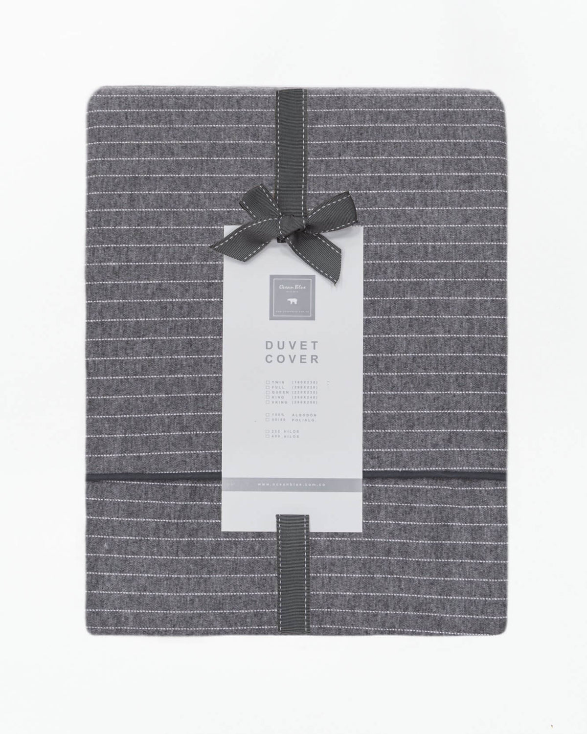 Elegant Merida Duvet Cover Set in soft beige tones, featuring smooth fabric texture for full, queen, king, or twin beds.