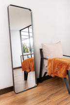 Elegant Espejo Venecia mirror with a sleek steel frame, adding a modern, sophisticated touch to any room.
