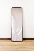 Elegant Espejo Venecia mirror with a sleek steel frame, adding a touch of modern sophistication to any room.