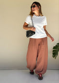 brown wide-leg flowy pants elastic waist side pockets