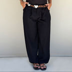 black wide-leg trousers elasticated hem detail