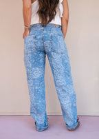 Indigo cotton drill jean with paisley print, barrel leg, and patch back pockets, view 3