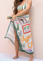 Green printed beach sarong, full spread showing print pattern