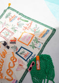 Green printed sarong with linen effect and tassel trim, draped view