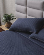 Elegant Santorini Azul Zigzag Duvet Set with a modern grainy zigzag texture, adding sophistication to your bedroom.