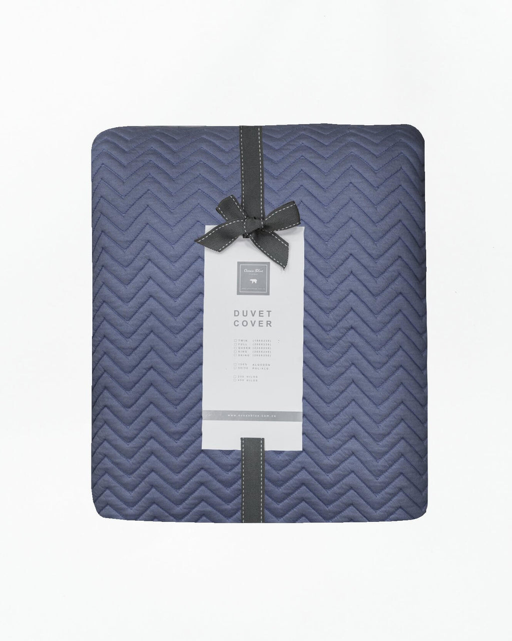 Elegant Santorini Azul Zigzag duvet set with a modern grainy texture and chic zigzag pattern, adding sophistication to your bedroom.