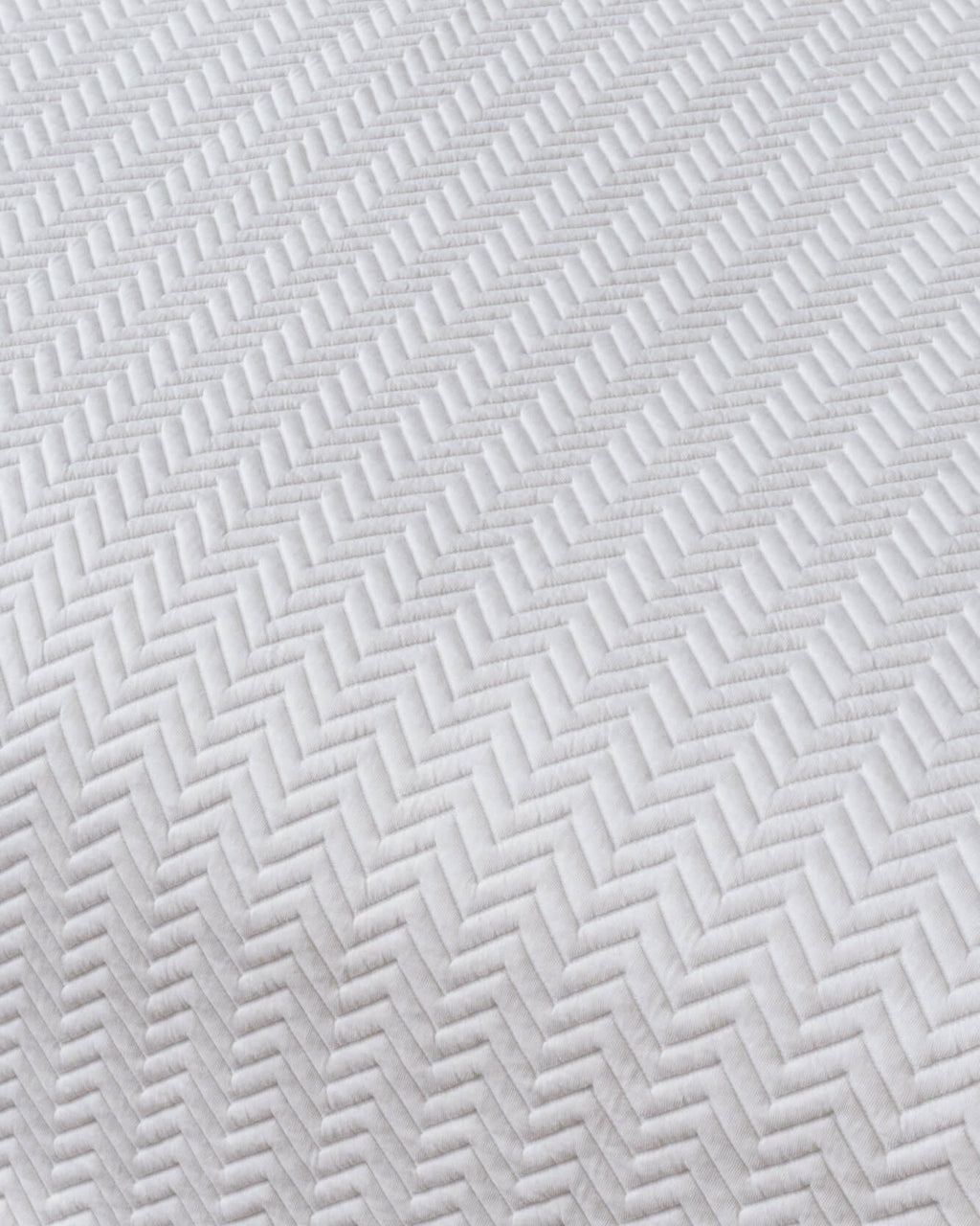 Elegant Santorini Crudo Zigzag duvet set with a modern grainy texture and subtle zigzag pattern, adding sophistication to your bedroom.