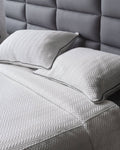 Elegant Santorini Crudo Zigzag duvet set with a modern grainy zigzag texture, adding sophistication to your bedroom.