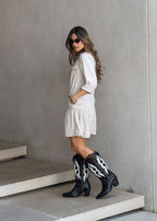 Beige challis long sleeve shirt dress with buttoned waistband and ruffled hem, view 4