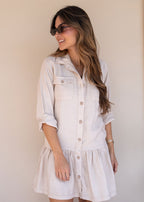 Beige challis long sleeve shirt dress with buttoned waistband and ruffled hem