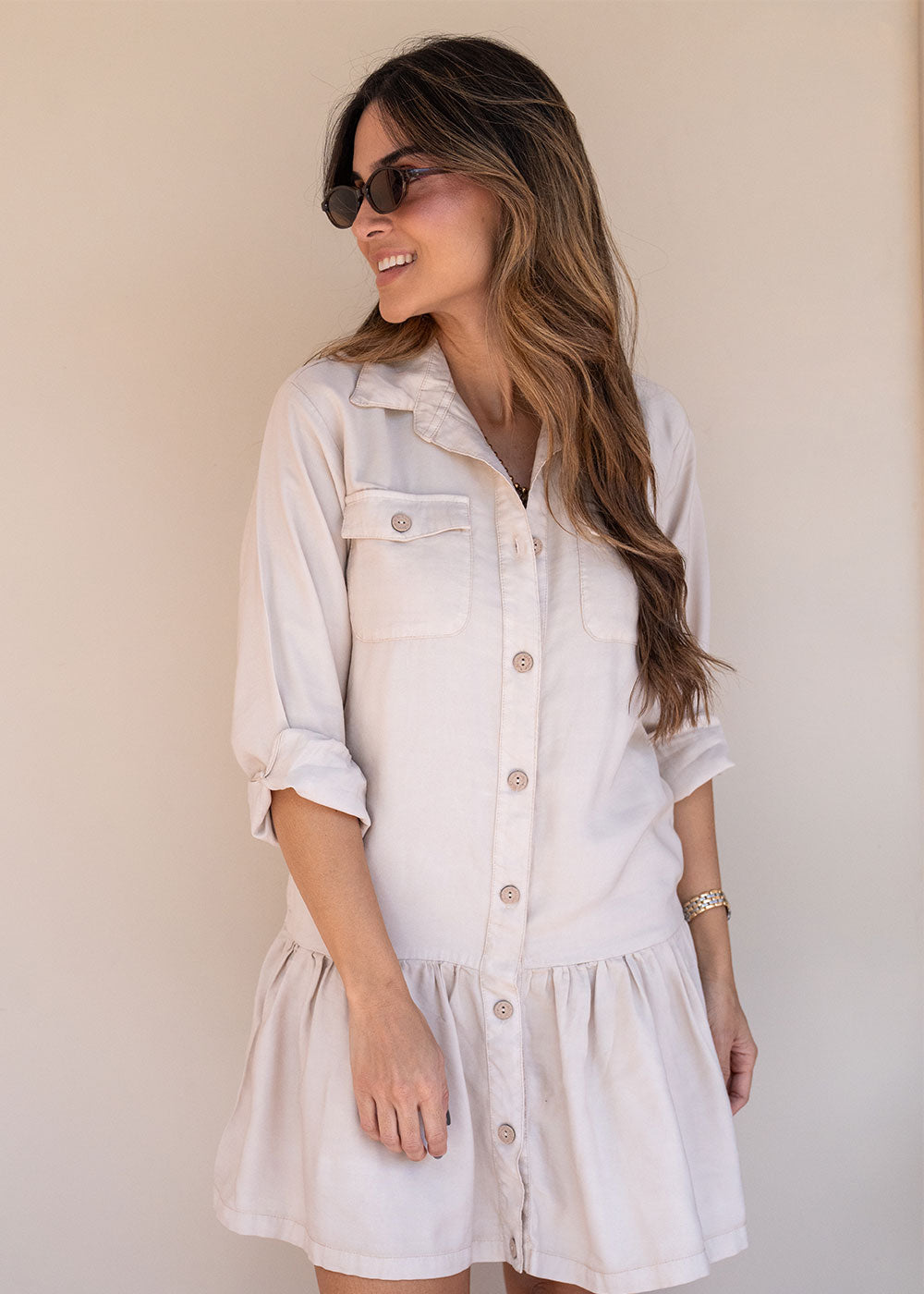 Beige challis long sleeve shirt dress with buttoned waistband and ruffled hem