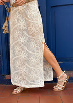 beige woven dress round neckline close-up