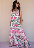 Ivory printed rayon maxi dress with wide straps, elastic waist, and ruffled hem